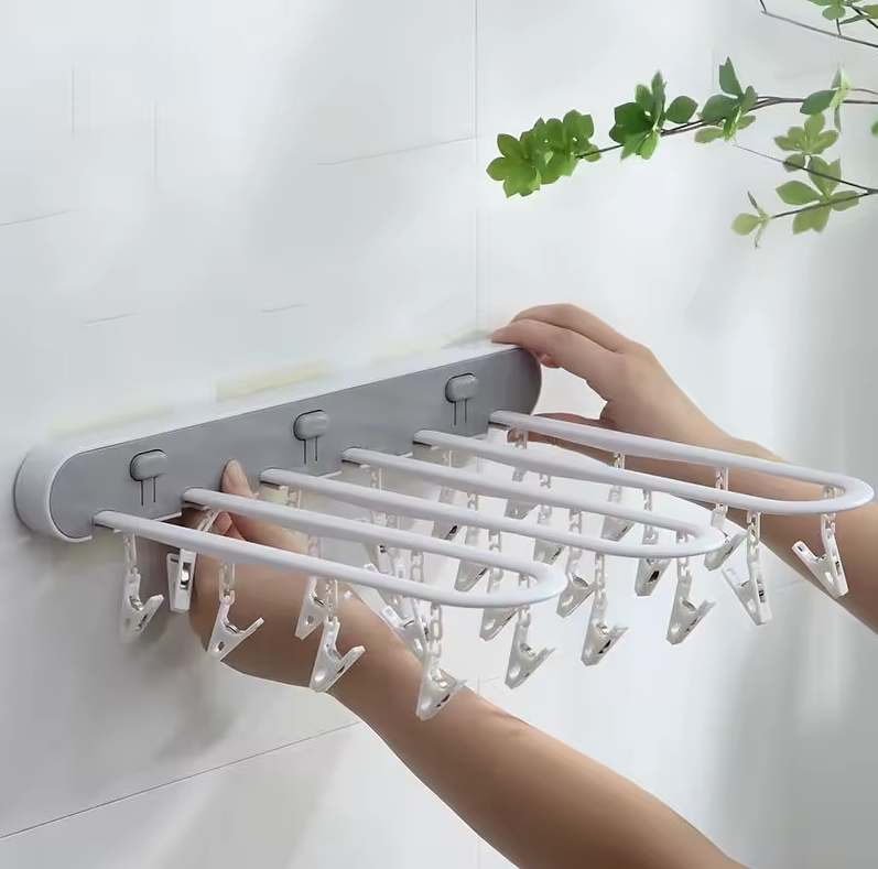 Étendoir Mural Pliable Multi-Pinces – Gain de place et Séchage Facile