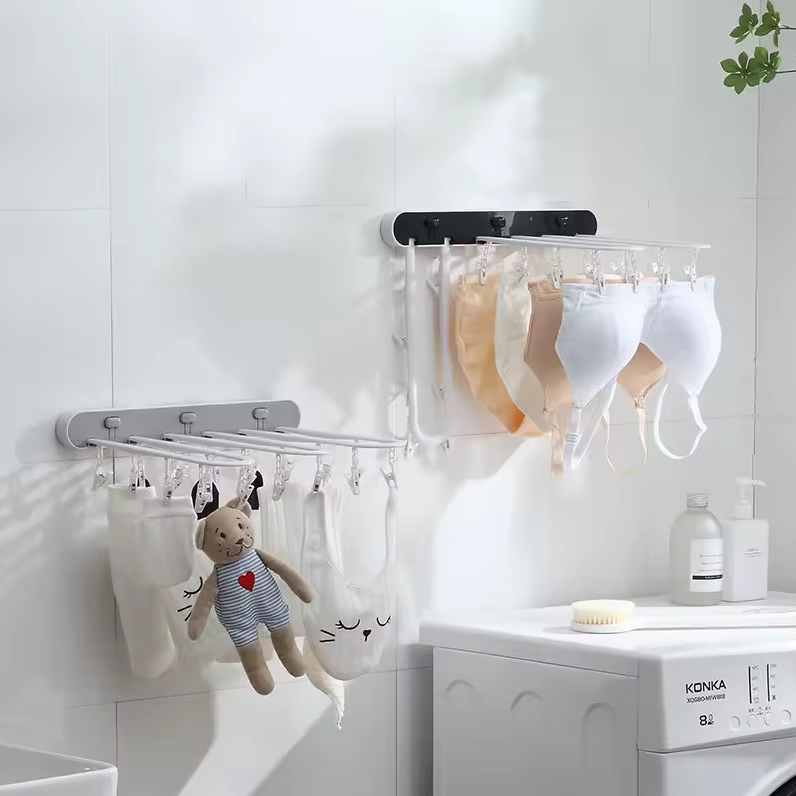 Étendoir Mural Pliable Multi-Pinces – Gain de place et Séchage Facile