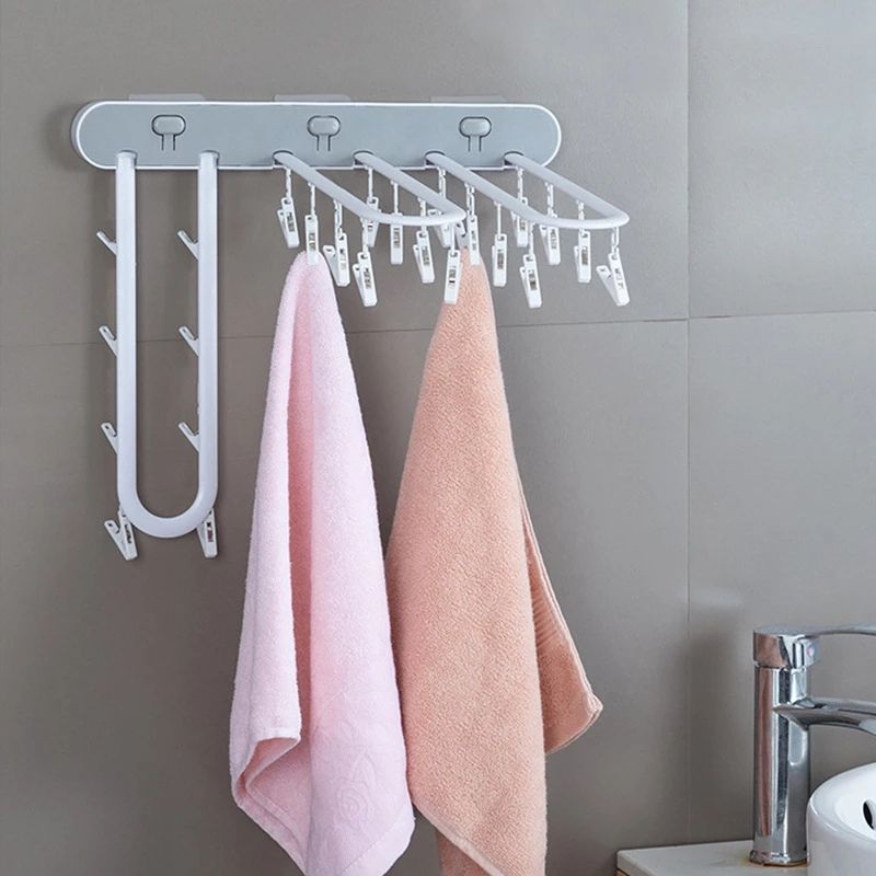 Étendoir Mural Pliable Multi-Pinces – Gain de place et Séchage Facile